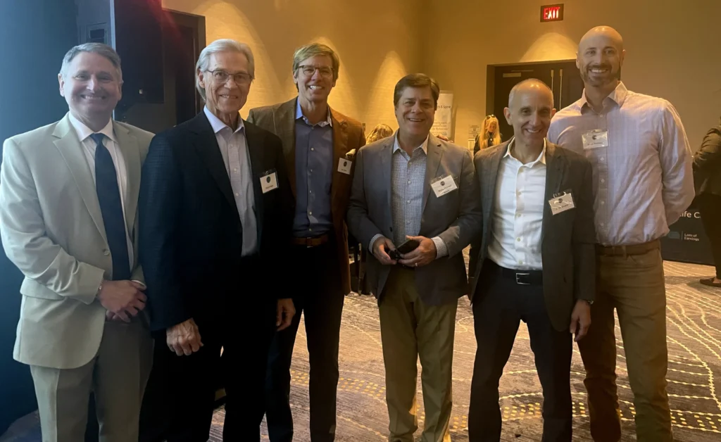 Terrell Hogan team celebrating Wayne Hogan's Michelline Hayes Ruth Award